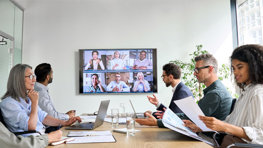 Video conference meeting being held in board room