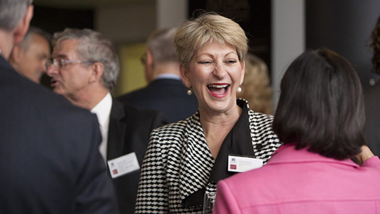Deans circle members at an event